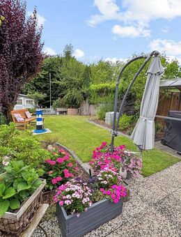 Wohlfühlhaus mit Gartenidylle - vermietetes Reihenmittelhaus in bester Lage - Spenge