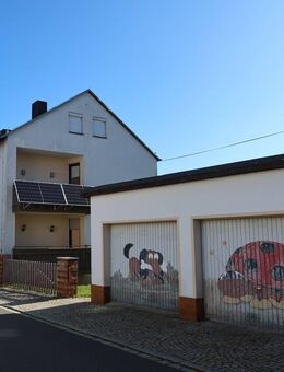 Zweifamilienhaus mit Wintergarten, Loggia und Garage für Mehrgenerationen oder Teilvermietung - Trogen