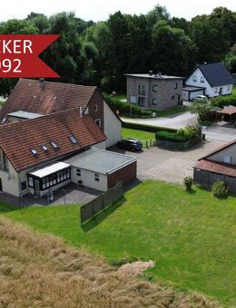 Wohnen oder vermieten in Bünde-Dünne! Dreifamilienhaus auf großem Grundstück + verpachteter Ackerfläche! - Bünde