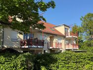 Helle 2 Zimmer Gartenwohnung mit 2 Zimmern im Souterrain und großer Nutzfläche - Planegg