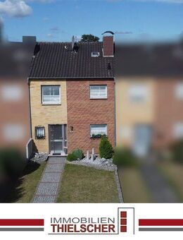 Charmantes Reihenmittelhaus mit schön angelegtem Garten und gutem Raumkonzept in zentraler Lage - Übach-Palenberg