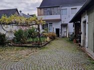Mehrfamilienhaus mit Ladenlokal, Garagen und Garten zentral in Koblenz-Neuendorf - Koblenz