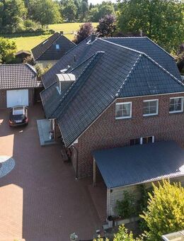 Sehr ansprechendes Zweifamilienhaus in toller Lage, mit über 320 m2 Wohnfläche auf 2 Etagen. - Twistringen