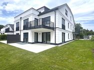 BEZUGSFERTIG - Großzügige EG-Wohnung mit großem Privatgarten und taghellem Souterrain (ausgebaut in Wohnraumqualität !) - München