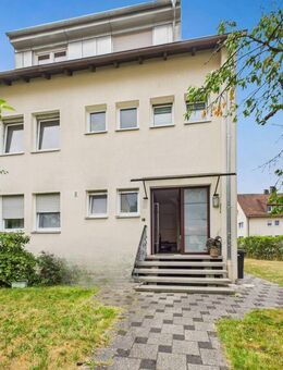 Gepflegtes Dreifamilienhaus mit großem Grundstück und einer freien Wohnung - Feucht