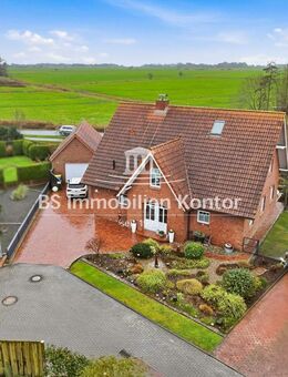 Pewsum! Zweifamilienhaus mit guter Ausstattung, Garage, Gartenanlage und Terrasse! - Krummhörn