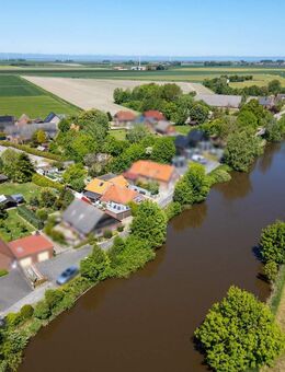 Haus in schöner Wasserlage mit viel Potenzial und großzügigem Garten in Wittmund/Neufunnixsiel - Wittmund