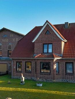 Vermietetes Mehrfamilienhaus mit 7 Wohnungen, 1 Appartement und großer Lagerfläche - Geltorf
