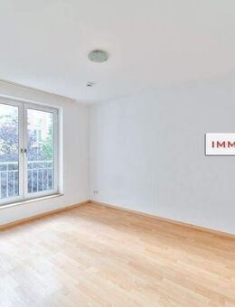 IMMOBERLIN.DE - Toplage Mitte! Ästhetische Wohnung mit Balkon, Tiefgaragenplatz & Concierge - Berlin