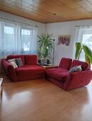 Sofa und Kamin in 34549