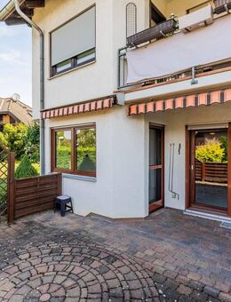 Erdgeschoss (Hochparterre) mit großer Terrasse und Souterrain mit 2 Tageslichtbädern, Kfz-Stellpl... - Bischofsheim
