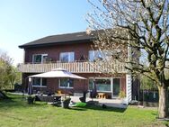 Großes Zweifamilienhaus mit zwei Garagen in grüner Stadtrandlage - Beckum