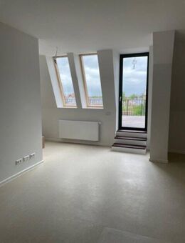 Exklusive 3-Zimmer-Wohnung im Mansardgeschoss des ehemaligen Postamtes mit Terrasse - Luckenwalde