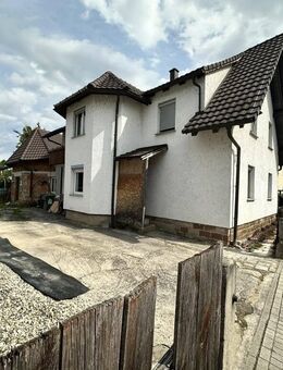 Wohnen & entwickeln: Einfamilienhaus mit Rohbau - Rheinau