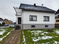 Grundstück mit Zweifamilienhaus wartet auf Sie - Weiskirchen