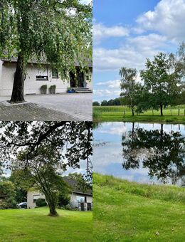 Einfamilienhaus idyllisch gelegen auf Traumgrundstück mit See in Wagenfeld - Wagenfeld