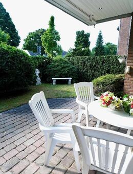 Traumhafte 122 m² Erdgeschosswohnung mit großzügigem Garten, Terrasse und TG Platz in Büderich - Meerbusch