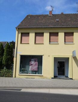 Wohn-, Geschäftshaus mit Bauland im Herzen von Wickrath - Mönchengladbach