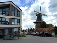 Wohnen am Norder Tief: Schöne Erdgeschosswohnung mit Blick auf die Mühle - Norden