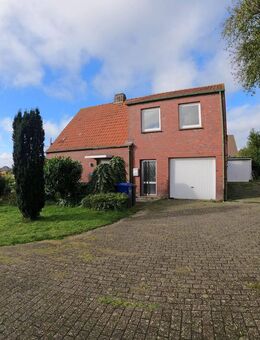 Wittmund OT - Nordseenähe - Gemütliches Ein-bis Zweifamilienhaus im Friesenstil mit großem Garten - Utarp