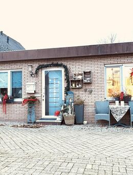 Vermietetes, ebenerdiges Reihenmittelhaus mit Garage in Butjadingen-Tossens für Kapitalanleger - Butjadingen