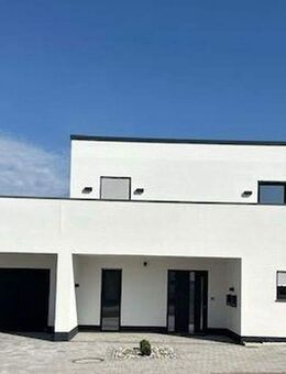 Erstbezug: Moderne Erdgeschosswohnung mit gehobenem Standard, inkl. hochwertiger EBK - Holzappel