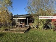 IMMOBERLIN.DE - Hübscher Gartenbungalow auf Eigenland in Tiergartensiedlung Oranienburg - Oranienburg