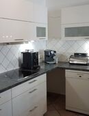 Hochglanz Einbauküche mit Elektrogeräten in 45476