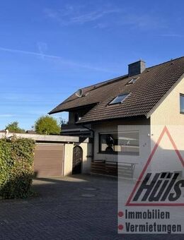 Gepflegtes Zweifamilienhaus mit zusätzlichen Appartement, Doppelgarage in ruhiger Siedlungslage - Osnabrück