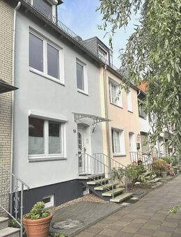 PURNHAGEN-IMMOBILIEN - Gepflegtes Reihenmittelhaus mit Garten in ruhiger Sackgassenlage von Aumund - Bremen