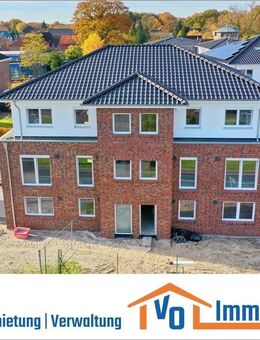 Erstbezug: Energieeffiziente Dachgeschosswohnung mit Balkon in zentraler Lage von Remels - Uplengen