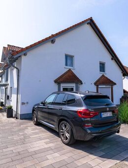 Gepflegte Doppelhaushälfte mit moderner Ausstattung und schönem Garten in Kirchhain - Kirchhain