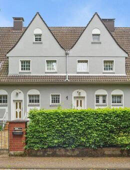 Engel & Völkers: Charmantes Mehrfamilienhaus mit herschaftlichem Flair und großem Garten - Troisdorf
