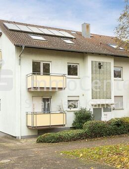 Investition mit Perspektive: Sanierungsbedürftige Wohnung mit 2 Balkonen und Garage in Wolfartsweier - Karlsruhe