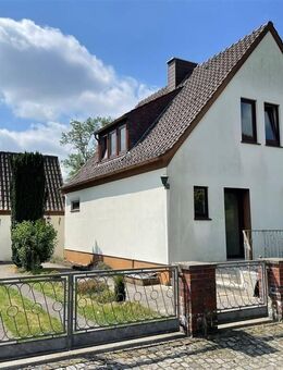 Gepflegtes Einfamilienhaus mit großem Garten und Garage in ruhiger Umgebung! - Oyten