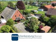 Reetgedecktes Zweifamilienhaus mit Ausbaureserve im Dachgeschoss - Lemwerder