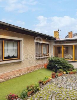Familienfreundlicher Bungalow mit Doppelgarage und viel Nebengelass - Teltow