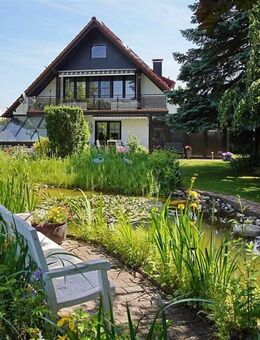 Wohnen auf höchstem Niveau - Freistehendes Einfamilienhaus mit Einliegerwohnung & Parkgarten in Heroldsberg - Heroldsberg