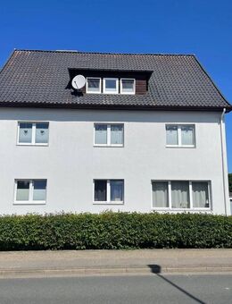 Mehrfamilienhaus mit 3 Wohnungen und Garagenanlage - Munster