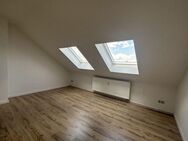 **Frisch sanierte, geräumige Dachgeschosswohnung - 3 Zimmer auf 65m²** - Luckenwalde