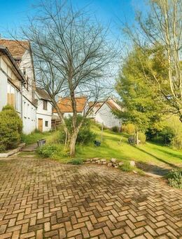 Splitlevel-Einfamilienhaus: Fachwerk-, Massivkombination mit Garten & Scheune - ideal für Handwerker - Weiler (Monzingen)