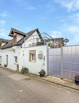 Einfamilienhaus mit Innenhof, Kamin und Potenzial für Individualisten im Herzen von Horrweiler - Horrweiler