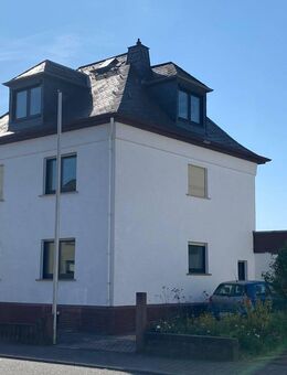 Verkehrsgünstig gelegenes Zweifamilienhaus mit Gewerbeanbau und großem Grundstück - Limburg (Lahn)