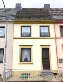 PURNHAGEN-IMMOBILIEN - Gröpelingen - Reihenmittelhaus mit Nebengebäuden in zentraler Lage - Bremen