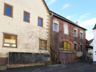 Zentral gelegene Immobilie mit Vorder-und Hinterhaus sowie Ausbaureserve im DG - Biebergemünd