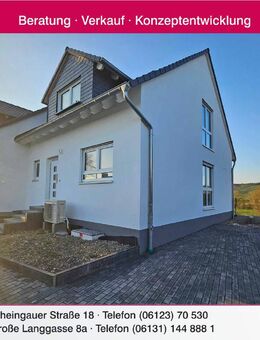 **Neubau-Erstbezug in Stadecken-Elsheim** Luxuriöse Doppelhaushälfte in gewachsener 1-A Wohnlage - Stadecken-Elsheim