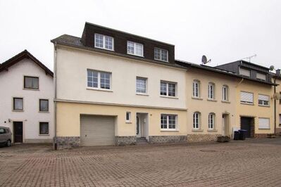 Gut gelegenes Reihenhaus + Baugrundstück in Langsur - Grenzah