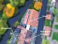 Eine Rarität: Traumhaftes Inselgrundstück (2.132 qm) mit 3 Gebäuden (880 qm) - Nähe Europapark - Kenzingen