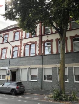 5-Familienhaus mit 14 Garagen, eine Gewerbeeinheit und eine große Gewerbehalle auf Kaufgrund in Herten-Scherlebeck - Herten