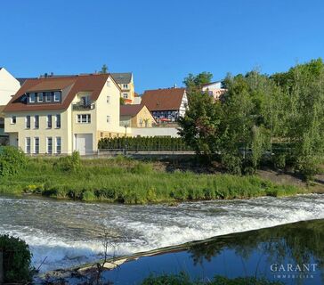 Gepflegtes Mehrfamilienhaus mit Terrasse und barrierefreien Bungalow sowie einer Garage